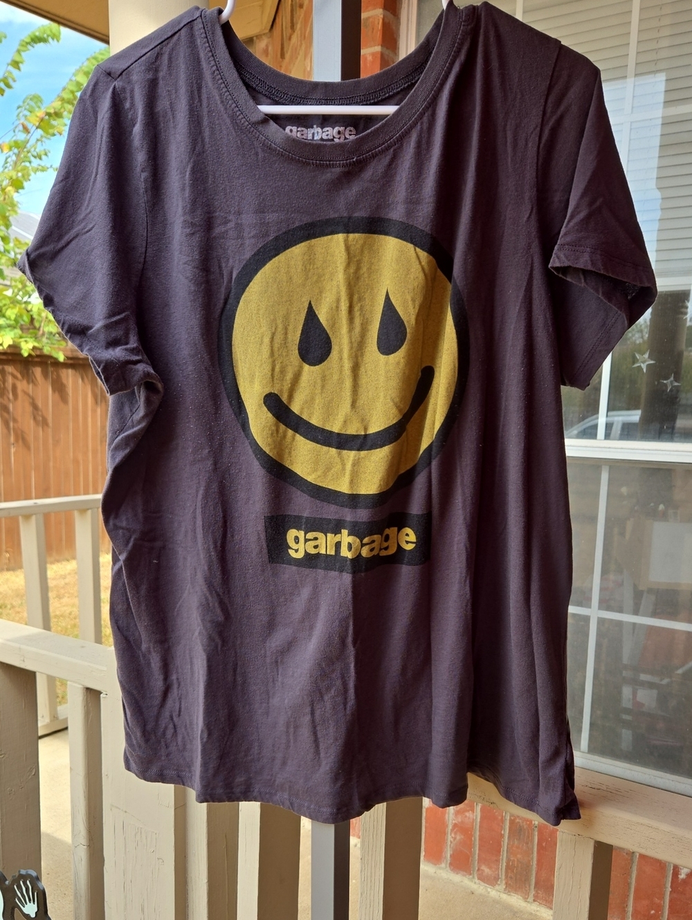Garage Black Tee with Yellow Smiley Face Graphic